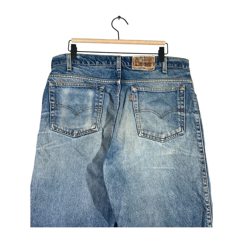 Vintage Levi's 550 Relaxed Fit Hemmed Distressed Denim Shorts 36