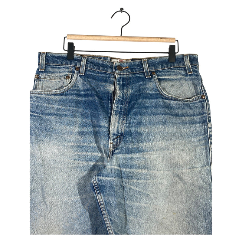 Vintage Levi's 550 Relaxed Fit Hemmed Distressed Denim Shorts 36