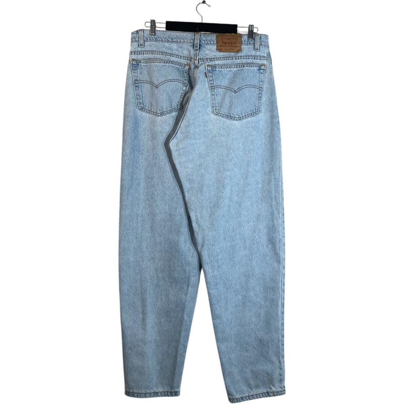 Vintage Levi's 560 Loose Fit Tapered Light Wash Jeans 38 x 32